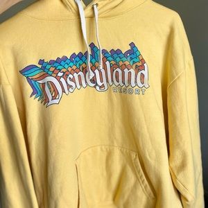 Disneyland Resort Hoodie in Yellow! Size M but it’s a little oversized.